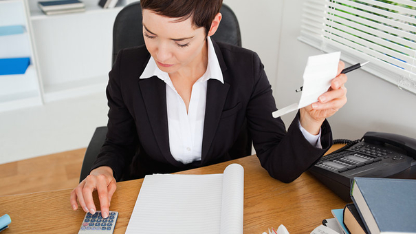 Active accountant checking receipts